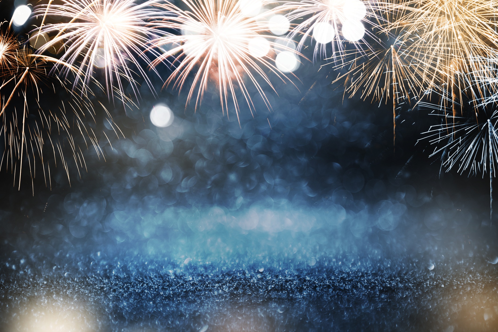 Gold and blue Fireworks and bokeh in New Year eve and copy space ... New Years Fireworks Wallpaper 2015